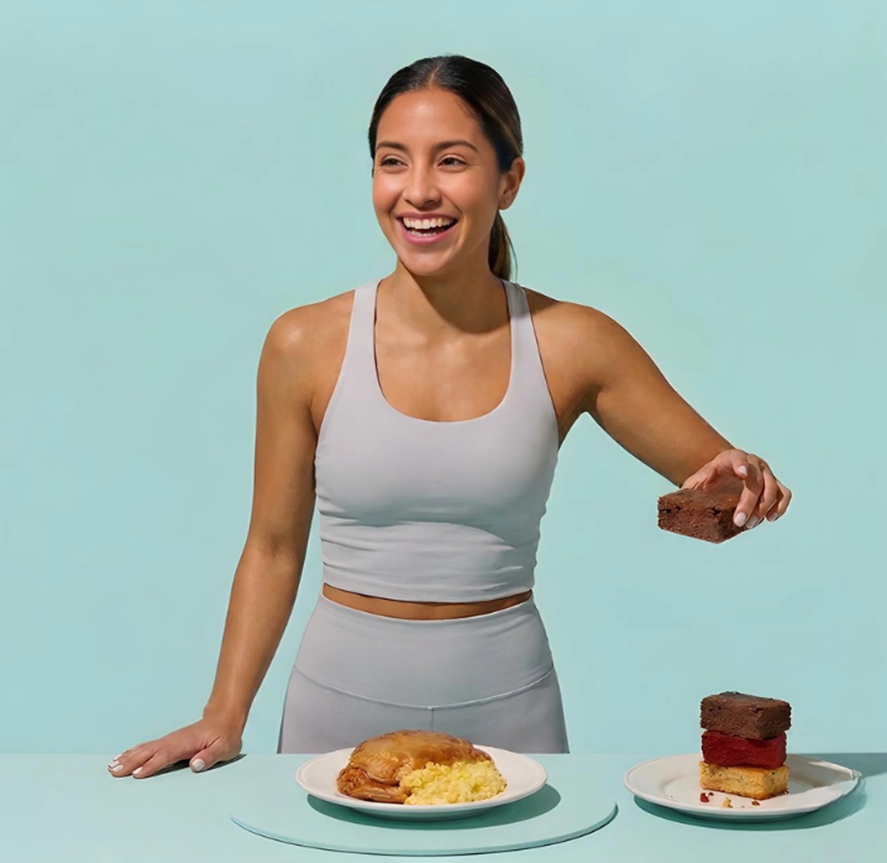 Woman with prepared meal plates hero image